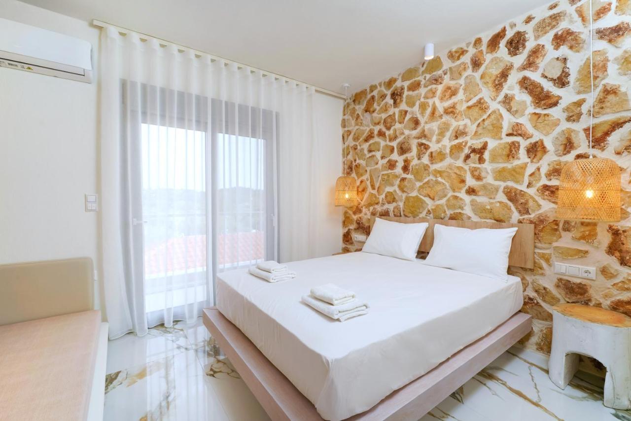 Athina Palace Luxurious Appartments Потос Екстериор снимка